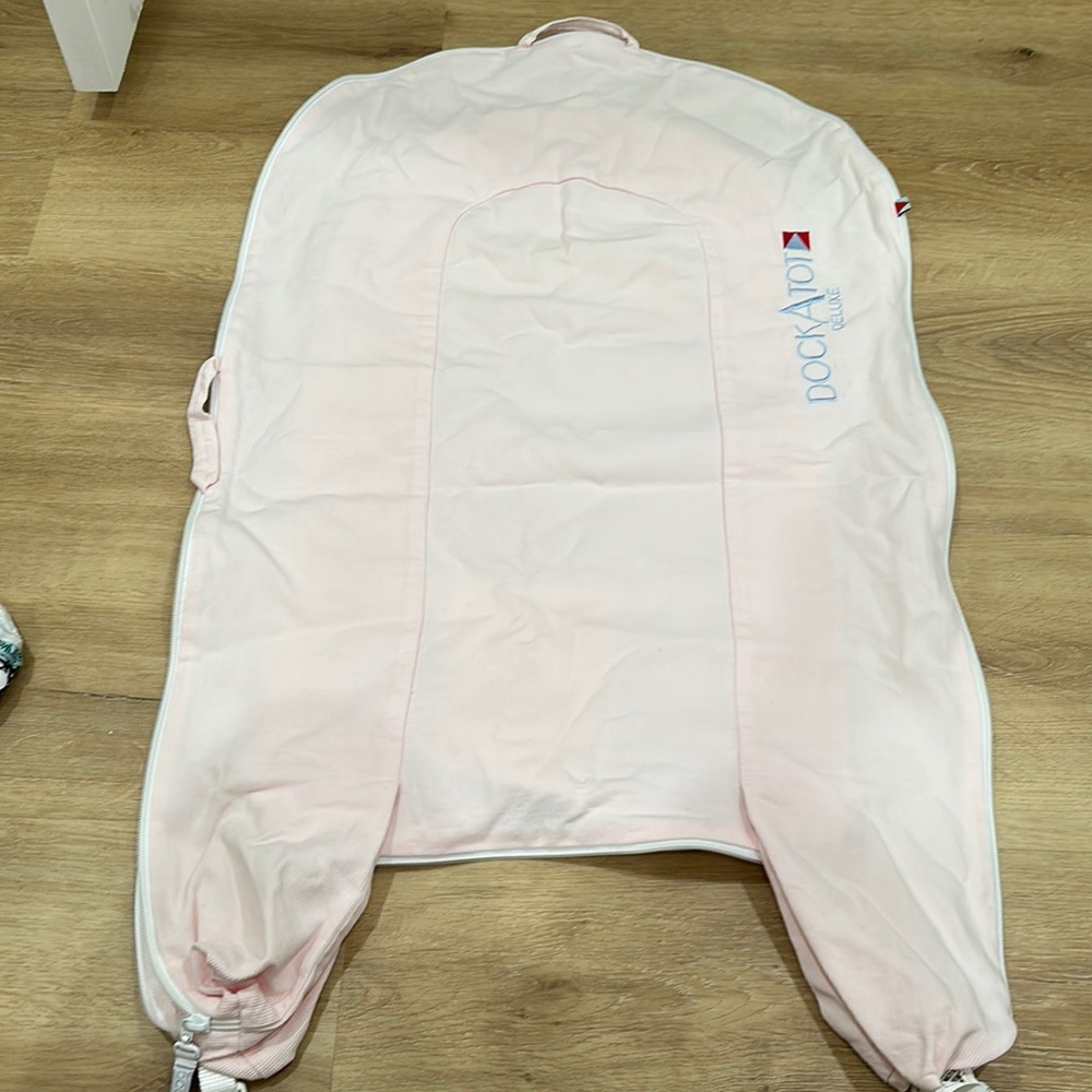 Dock a tot deluxe  pink corduroy cover stage 1 0-8 months